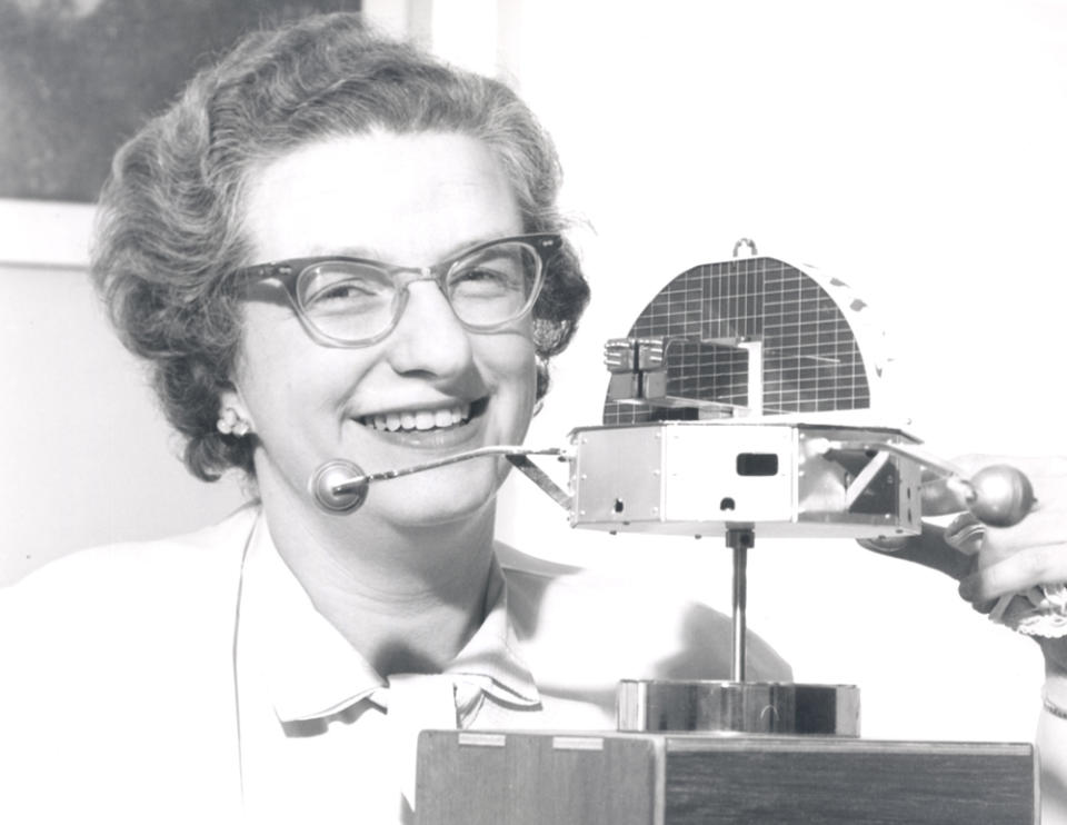 Nancy Grace Roman was the first chief of astronomy in the Office of Space Science at NASA Headquarters, and she helped fight for what would become the Hubble Space Telescope. She is seen here in 1963 with a model of the Orbiting Solar Observatory. <cite>NASA/Kepler Team</cite>